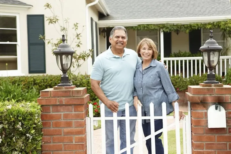 Happy homeowners selling their house to Providence Home Buyers